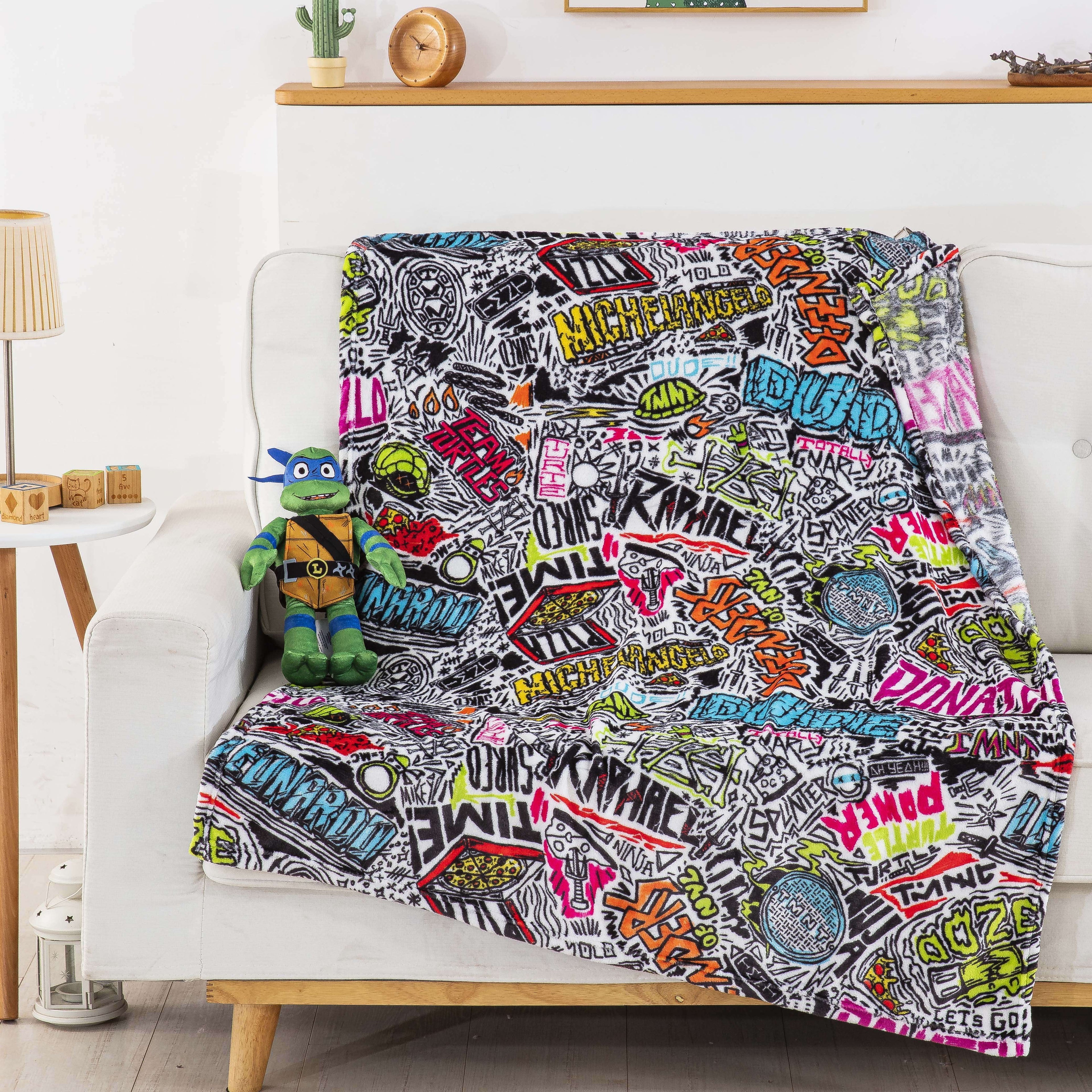 Super Soft Flannel Teenage Mutant Tutles Sketched Out Kids Silk Touch Throw Blanket with Plush Hugger – Ultra Soft Plush Character Pillo... - Super Soft Reversible Sherpa Flannel Blanket Detail